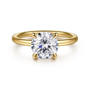 Gabriel & Co. ER16569R6Y4JJJ 14 karat yellow gold Contemporary engagement ring, front view of a round center in four rounded claws on a slim band with no stones
