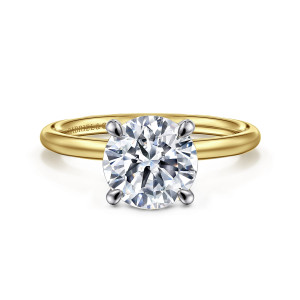 Gabriel & Co. ER16569R8M4JJJ 14 karat white and yellow gold Contemporary engagement ring, front view of a round center held by four teardrop tipped prongs above a thin plain band