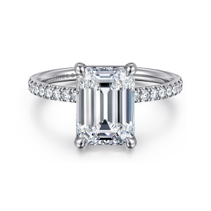 Gabriel & Co. ER16570E12W44JJ 14 karat white gold Contemporary engagement ring, front view of an emerald cut center with four tapered prongs and diamonds on both shoulders