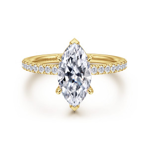 Gabriel & Co. ER16570M6Y44JJ 14 karat yellow gold Contemporary engagement ring, front view of a marquise center with pointed end prongs and small round diamonds on the band