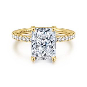 Gabriel & Co. ER16570N12Y44JJ 14 karat yellow gold Contemporary engagement ring, front view of a radiant cut center held by four rounded claw prongs above a slim band