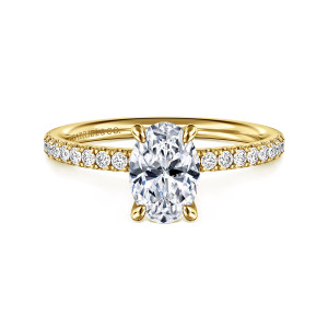 Gabriel & Co. ER16570O4Y44JJ 14 karat yellow gold Contemporary engagement ring, front view of an oval center held by four rounded claw prongs above a slim diamond set band