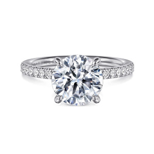 Gabriel & Co. ER16570R10W44JJ 14 karat white gold Contemporary engagement ring, front view of a round center with four rounded prong tips and small stones lining each shoulder