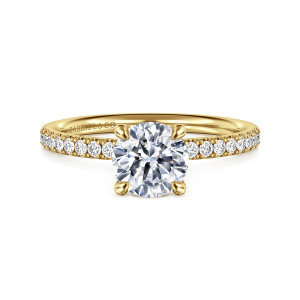Gabriel & Co. ER16570R4Y44JJ 14 karat yellow gold Contemporary engagement ring, front view of a round center in four teardrop tipped prongs with diamonds along the shoulders