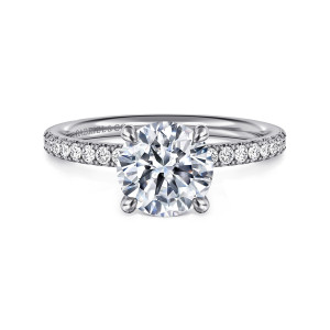 Gabriel & Co. ER16570R6W44JJ 14 karat white gold Contemporary engagement ring, front view of a round center in four tapered claws with small diamonds on each shoulder