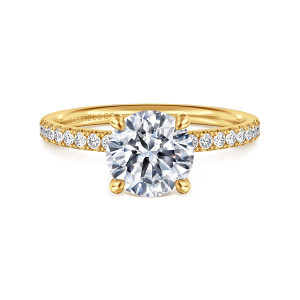 Gabriel & Co. ER16570R6Y84JJ 18 karat yellow gold Contemporary engagement ring, front view of a round center held by four teardrop tipped prongs above pave