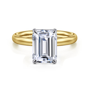 Gabriel & Co. ER16571E12M4JJJ 14 karat white and yellow gold Contemporary engagement ring, front view of a tall emerald cut center gripped at its corners by rounded claws