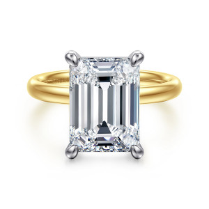 Gabriel & Co. ER16571E20M4JJJ 14 karat white and yellow gold Contemporary engagement ring, front view of an emerald cut center held by four teardrop claws above a smooth rounded band