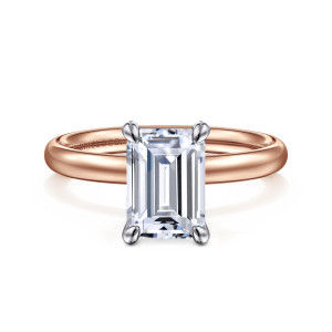 Gabriel & Co. ER16571E8T4JJJ 14 karat white and rose gold Contemporary engagement ring, front view of an emerald cut center between four rounded prongs on a smooth domed band