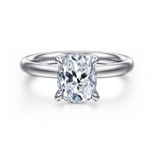 Gabriel & Co. ER16571G8W4JJJ 14 karat white gold Contemporary engagement ring, front view of an elongated cushion center held by rounded claw tips over a plain band
