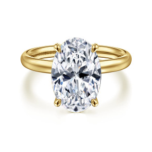 Gabriel & Co. ER16571O16Y4JJJ 14 karat yellow gold Contemporary engagement ring, front view of a large oval center with slim claws at both ends and a smooth band
