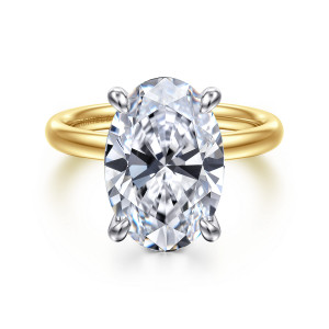 Gabriel & Co. ER16571O20M4JJJ 14 karat white and yellow gold Contemporary engagement ring, front view of a broad oval center between four rounded prongs above a plain band