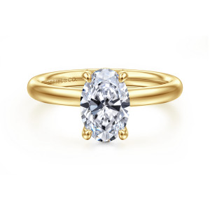 Gabriel & Co. ER16571O6Y4JJJ 14 karat yellow gold Contemporary engagement ring, front view of an oval center on slim rounded tip prongs above a smooth stoneless band
