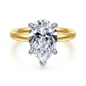 Gabriel & Co. ER16571P12M4JJJ 14 karat white and yellow gold Contemporary engagement ring, front view of a pear shaped center with rounded prongs and a V tip at its point