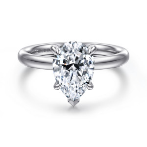Gabriel & Co. ER16571P8W4JJJ 14 karat white gold Contemporary engagement ring, front view of the pear shaped center with a pointed V prong at its tip