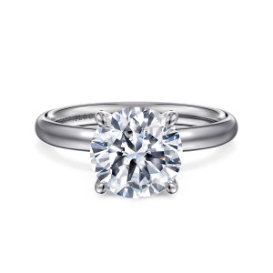 Gabriel & Co. ER16571R10W4JJJ 14 karat white gold Contemporary engagement ring, front view of a round center with four prongs on a smooth domed band without any stones