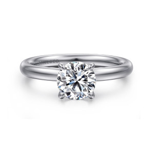 Gabriel & Co. ER16571R4W4JJJ 14 karat white gold Contemporary engagement ring, front view of the round center between rounded prong tips over a polished domed band