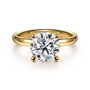 Gabriel & Co. ER16571R8Y4JJJ 14 karat yellow gold Contemporary engagement ring, front view of a round center held by four teardrop tipped claws over a plain band