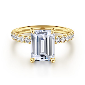 Gabriel & Co. ER16572E12Y44JJ 14 karat yellow gold Contemporary engagement ring, front view of an emerald cut center at four rounded claws with round diamonds beside it