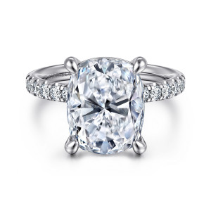 Gabriel & Co. ER16572G20W44JJ 14 karat white gold Contemporary engagement ring, front view of an elongated cushion center with four rounded prongs between diamond shoulders