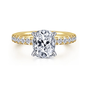 Gabriel & Co. ER16572G8M44JJ 14 karat white and yellow gold Contemporary engagement ring, front view of the center stone held by four rounded prongs above small diamonds
