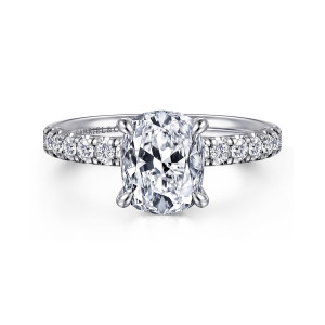 Gabriel & Co. ER16572G8W44JJ 14 karat white gold Contemporary engagement ring, front view of an elongated center in four teardrop prongs with fairly large round diamonds on each shoulder