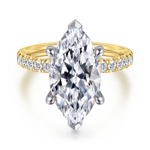 Gabriel & Co. ER16572M20M44JJ 14 karat white and yellow gold Contemporary engagement ring, front view of a marquise center with V-shaped end tips and rounded side claws over a diamond band