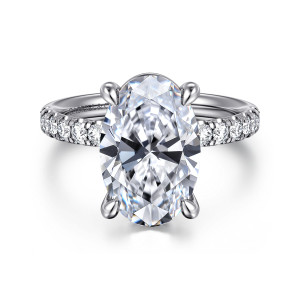 Gabriel & Co. ER16572O16W44JJ 14 karat white gold Contemporary engagement ring, front view of a large oval center with smooth claws curving over its ends