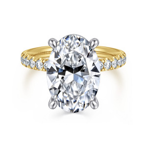 Gabriel & Co. ER16572O20M44JJ 14 karat white and yellow gold Contemporary engagement ring, front view of a broad oval center between four rounded prongs with diamonds at both shoulders