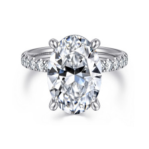 Gabriel & Co. ER16572O20W44JJ 14 karat white gold Contemporary engagement ring, front view of a large oval center between four rounded prongs with diamonds beginning on each shoulder