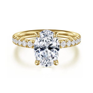 Gabriel & Co. ER16572O8Y44JJ 14 karat yellow gold Contemporary engagement ring, front view of an oval center held by claw prongs above stones set into both shoulders