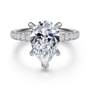 Gabriel & Co. ER16572P12W44JJ 14 karat white gold Contemporary engagement ring, front view of a pear shaped center, a V shaped prong at its point, diamonds on both shoulders