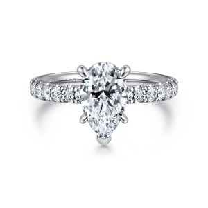 Gabriel & Co. ER16572P6W84JJ 18 karat white gold Contemporary engagement ring, front view of a pear shaped center with a pointed V shaped prong at its narrow tip