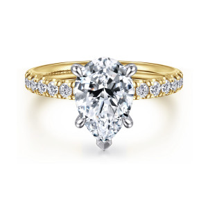 Gabriel & Co. ER16572P8M44JJ 14 karat white and yellow gold Contemporary engagement ring, front view of a pear shaped center with its point held by a V tip between rounded claws