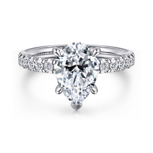 Gabriel & Co. ER16572P8W44JJ 14 karat white gold Contemporary engagement ring, front view of a pear shaped center with a V-shaped tip at the point and rounded claws