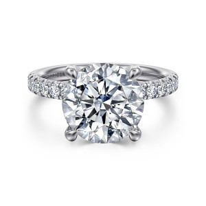 Gabriel & Co. ER16572R16W44JJ 14 karat white gold Contemporary engagement ring, front view of a broad round center between four rounded prongs with diamonds on both shoulders