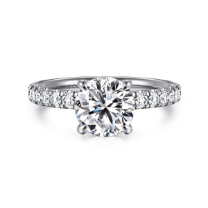 Gabriel & Co. ER16572R6W44JJ 14 karat white gold Contemporary engagement ring, front view of a round center held by four claws with round diamonds down both shoulders