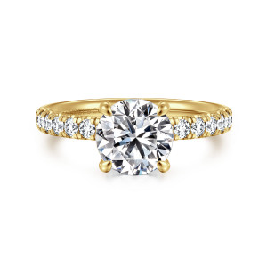 Gabriel & Co. ER16572R6Y44JJ 14 karat yellow gold Contemporary engagement ring, front view of a round center gripped by four claws between diamond shoulders