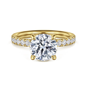 Gabriel & Co. ER16572R8Y44JJ 14 karat yellow gold Contemporary engagement ring, front view of a round center held by four drop tipped prongs above diamonds on each shoulder