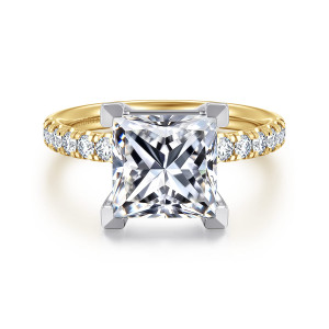 Gabriel & Co. ER16572S12M44JJ 14 karat white and yellow gold Contemporary engagement ring, front view of a princess cut center gripped at its corners by flat topped prongs