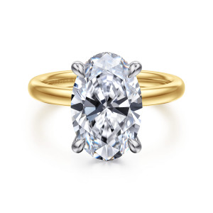 Gabriel & Co. ER16618O16M44JJ 14 karat white and yellow gold Classic engagement ring, front view of a tall oval center held by four rounded tip prongs above a smooth band