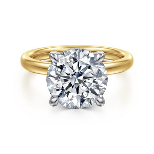 Gabriel & Co. ER16618R16M44JJ 14 karat white and yellow gold Classic engagement ring, front view of a round center held by four prongs above a smooth rounded band