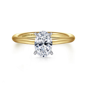 Gabriel & Co. ER16619O4M44JJ 14 karat white and yellow gold Classic engagement ring, front view of an oval center held by slim prongs above a smooth rounded band