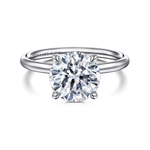 Gabriel & Co. ER16619R10W44JJ 14 karat white gold Classic engagement ring, front view of a round center held by four slim prongs on a smooth band