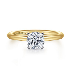 Gabriel & Co. ER16619R4M44JJ 14 karat white and yellow gold Classic engagement ring, front view of a round center on four claw prongs above a slim plain band