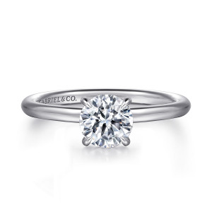 Gabriel & Co. ER16619R4W44JJ 14 karat white gold Classic engagement ring, front view of a round center held by four prongs on a plain rounded band