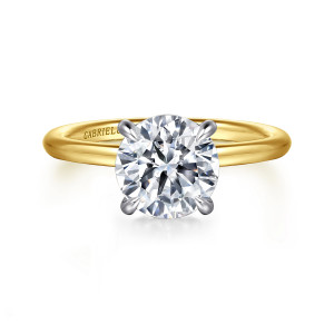 Gabriel & Co. ER16619R8M44JJ 14 karat white and yellow gold Classic engagement ring, front view of a round center gripped by four tapered prongs against a thin polished band
