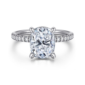 Gabriel & Co. ER16620G12W44JJ 14 karat white gold Classic engagement ring, front view of an elongated cushion center held by four rounded prongs above a pave band