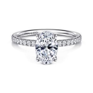 Gabriel & Co. ER16620O6W44JJ 14 karat white gold Classic engagement ring, front view of an oval center held by four claw prongs above a band of small stones