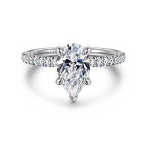 Gabriel & Co. ER16620P6W44JJ 14 karat white gold Classic engagement ring, front view of a pear shaped center with small diamonds running along the slim band